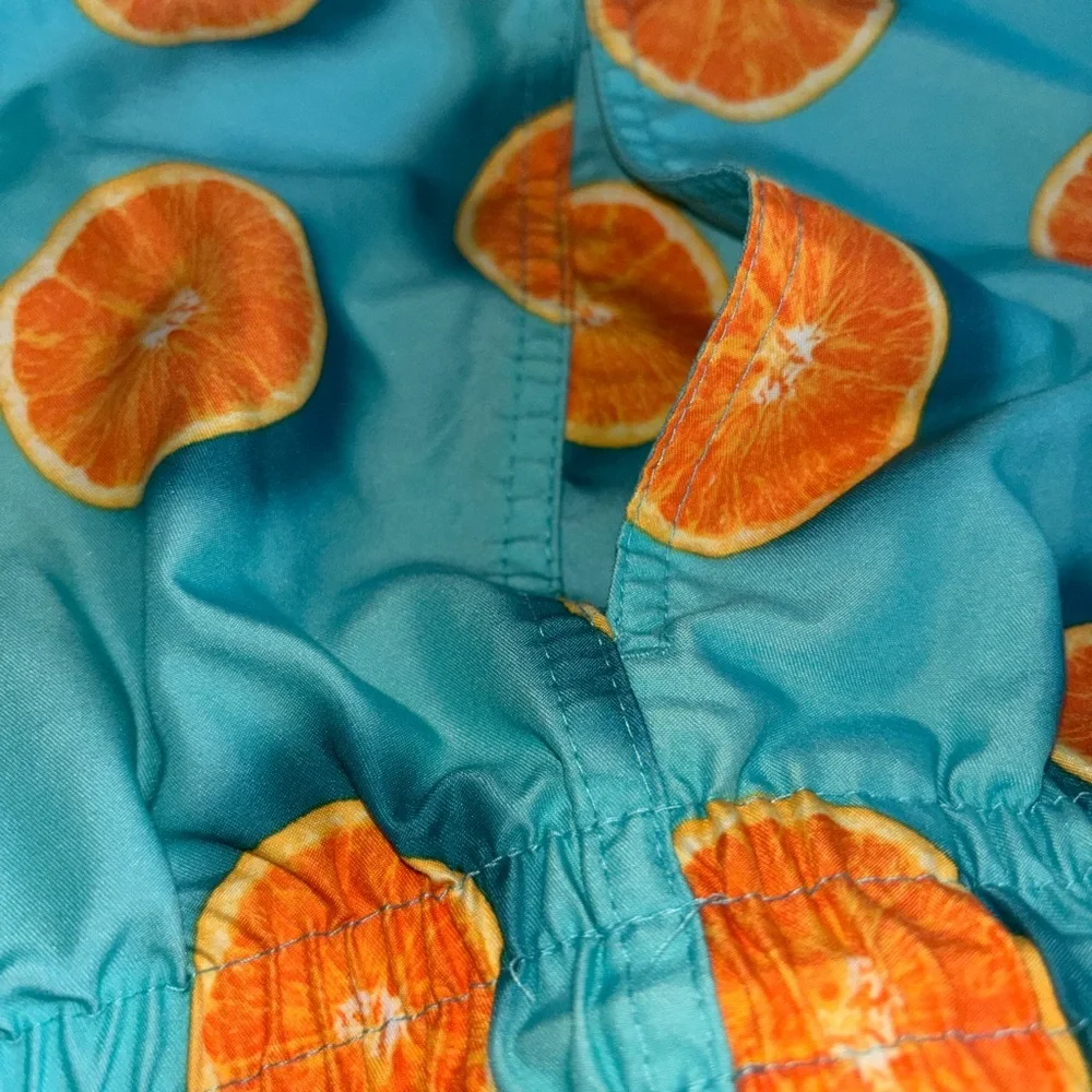 Old Navy Turquoise Swim Trunks with Orange Slice Print